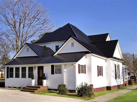 white house black metal roof|white house black roof pictures.